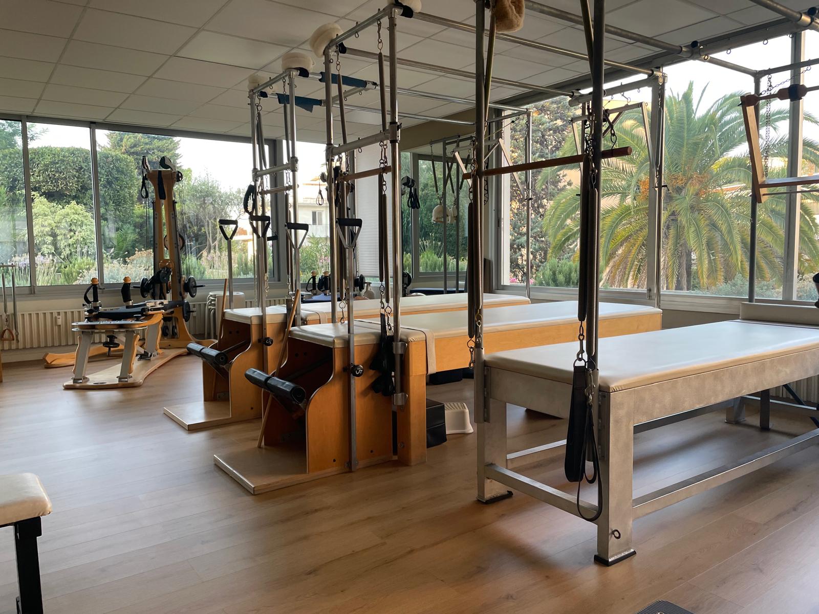 Cadillac apparatus and GYROTONIC® Pulley Tower overlooking sunny palms